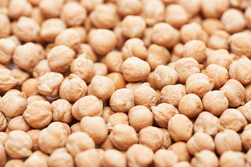 close up view of uncooked organic chickpea