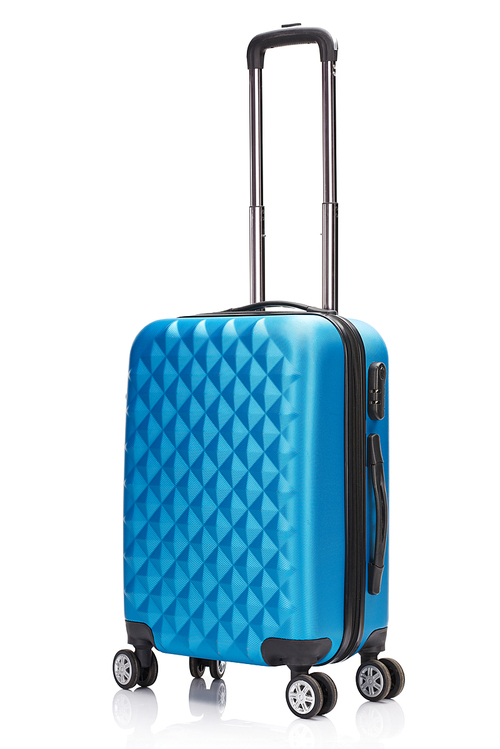 blue wheeled textured suitcase with handle isolated on white
