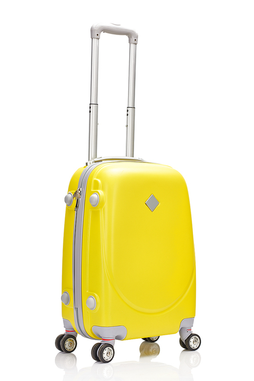 yellow wheeled colorful suitcase with handle isolated on white