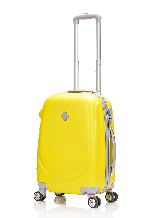yellow plastic wheeled suitcase with handle isolated on white