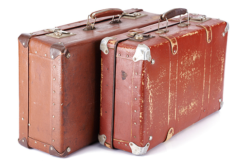 two leather brown retro suitcases isolated on white