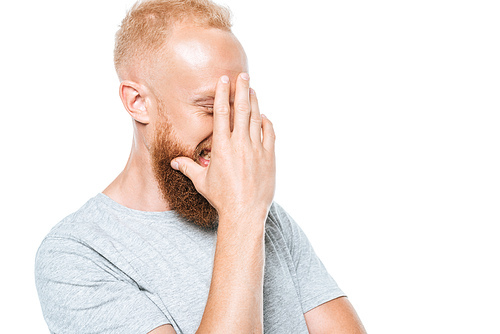 handsome bearded man with facepalm, isolated on white