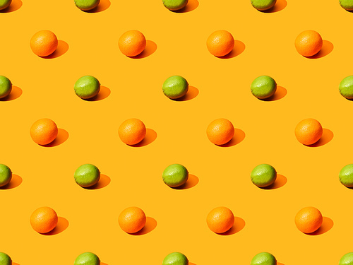 ripe oranges and limes on colorful background, seamless pattern