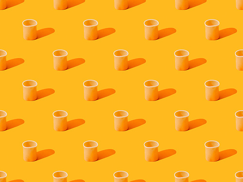 fresh cannelloni on orange colorful background, seamless pattern