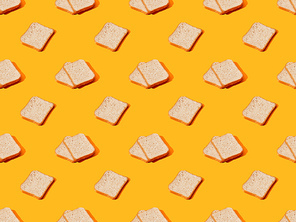fresh toast bread on orange colorful background, seamless pattern