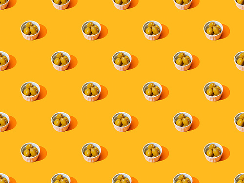 olives in bowls on orange colorful background, seamless pattern
