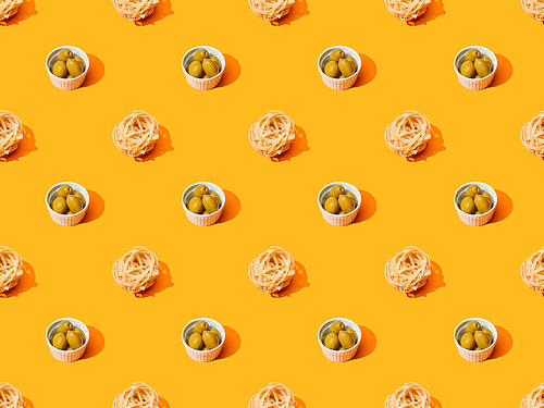 fresh pasta with olives on orange colorful background, seamless pattern