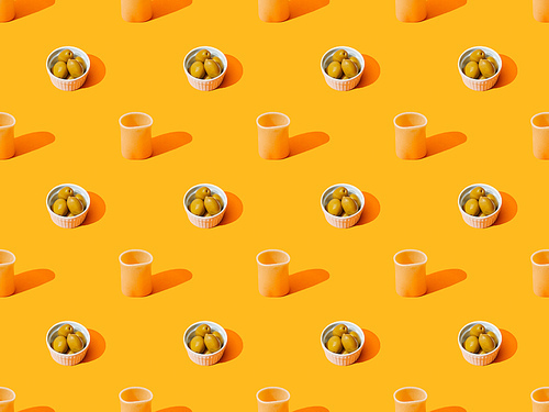 cannelloni and olives on orange colorful background, seamless pattern