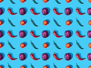 top view of whole ripe cabbage, tomatoes and peppers on blue background, seamless pattern