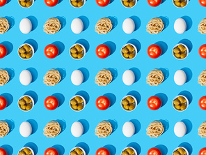 top view of fresh pasta with olives, tomatoes and eggs on blue background, seamless pattern