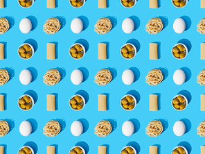 top view of fresh pasta with olives and eggs on blue background, seamless pattern