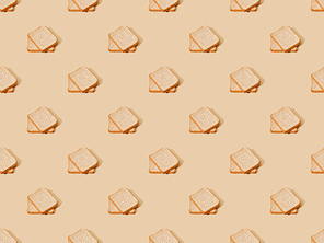 fresh toast bread on beige background, seamless pattern