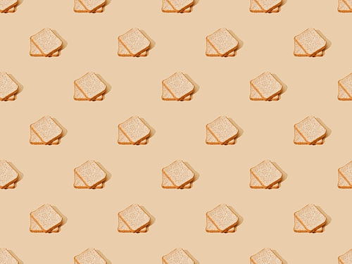 fresh toast bread on beige background, seamless pattern