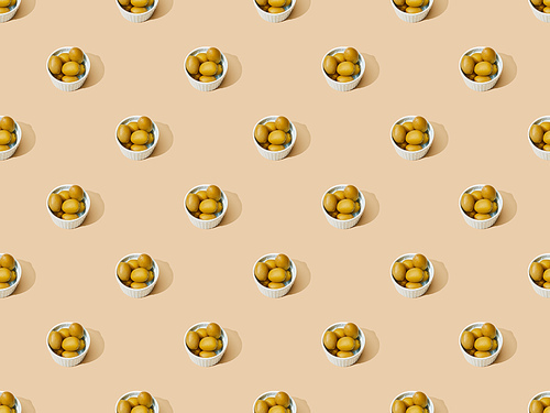 olives in bowls on beige background, seamless pattern
