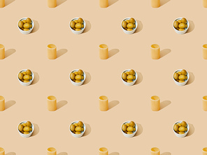fresh cannelloni with olives on beige background, seamless pattern