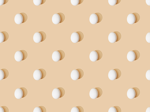 top view of fresh chicken eggs on beige background, seamless pattern