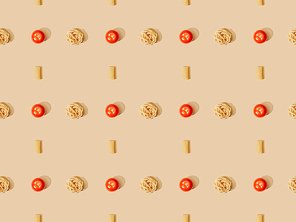top view of fresh pasta with tomatoes on beige background, seamless pattern