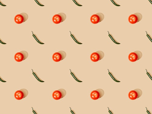 top view of tomatoes and jalapenos on beige background, seamless pattern