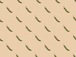 top view of jalapenos on beige background, seamless pattern