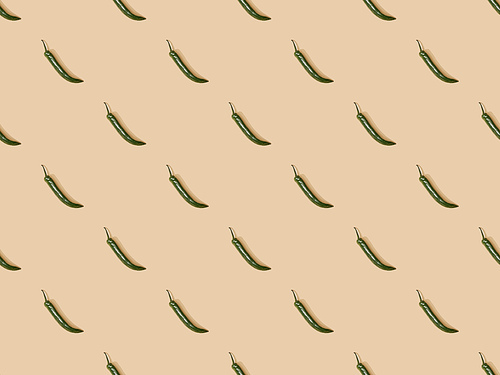 top view of jalapenos on beige background, seamless pattern