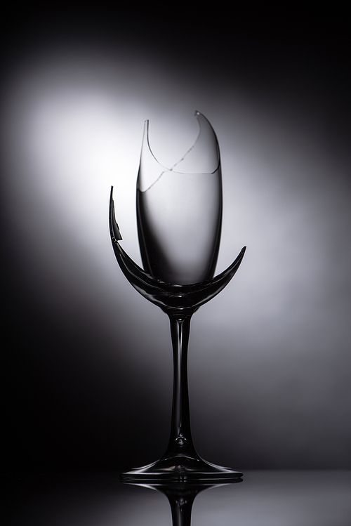 broken sharp transparent glass in dark