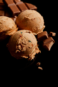 fresh delicious chocolate ice cream isolated on black