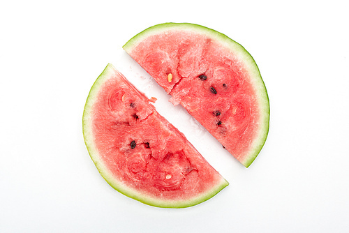 top view of round cut delicious watermelon on white background