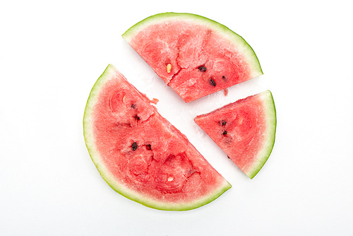 top view of round cut watermelon slices on white background