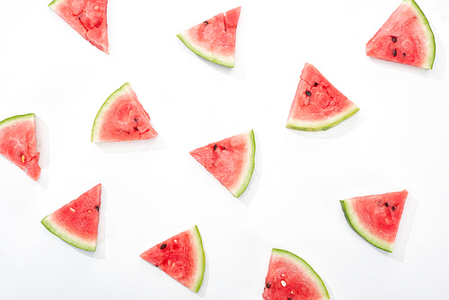 top view of fresh watermelon slices on white background
