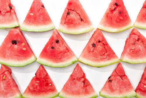 flat lay with juicy watermelon slices on white background