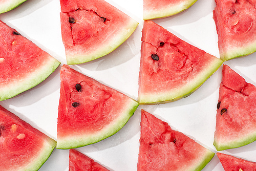 flat lay with delicious watermelon slices on white background