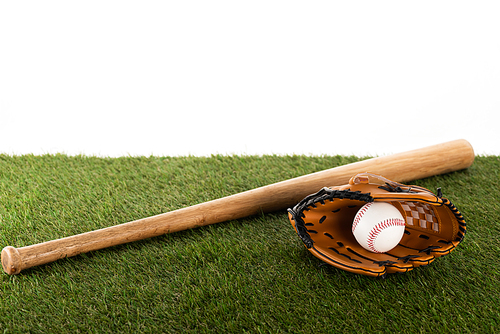 baseball bat, glove and ball on green grass isolated on white, sports betting concept