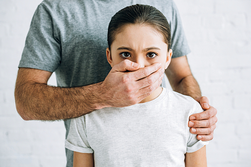 cropped view of father and daughter having conflict at home