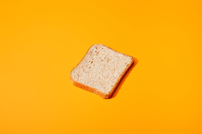 fresh toast bread on orange colorful background