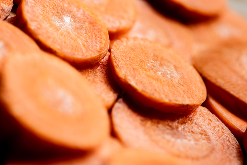 close up view of fresh ripe carrot slices