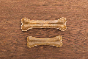 top view of pet bones on wooden table