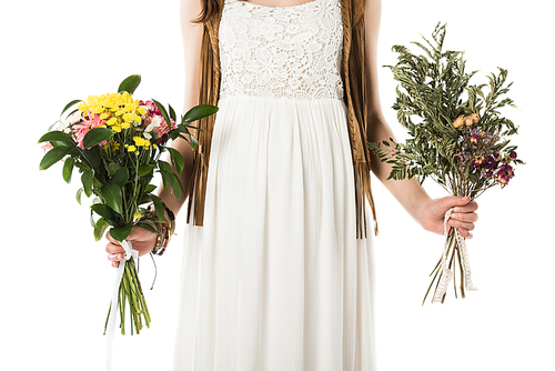 cropped view of pregnant hippie woman in wreath holding flowers isolated on white