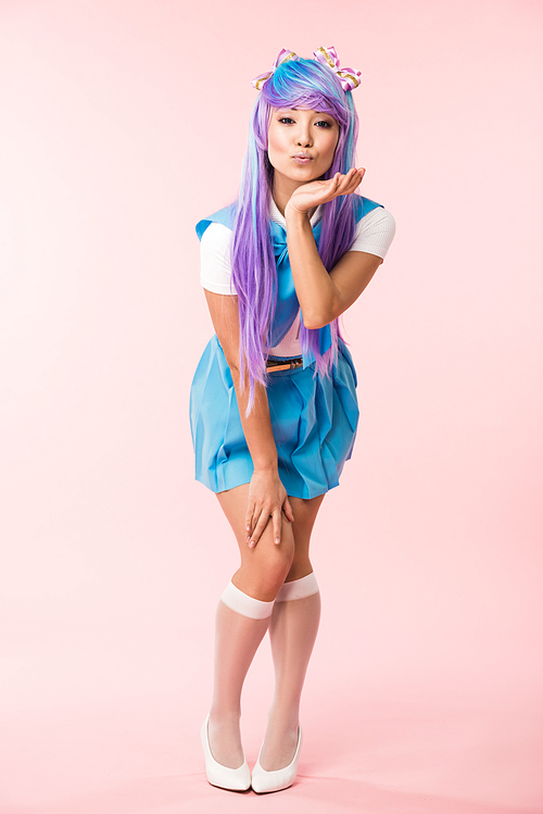 Full length view of asian anime girl in purple wig posing