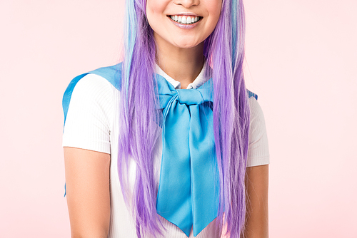 Cropped view of laughing anime girl in wig isolated on pink