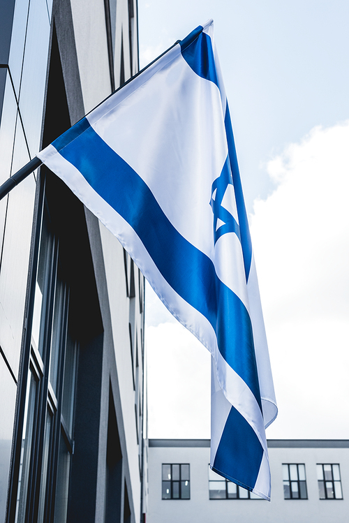 low angle view of national israel flag near building