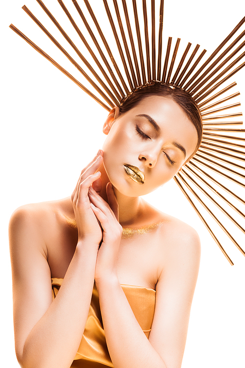 young beautiful woman with closed eyes, golden makeup and accessory on head isolated on white