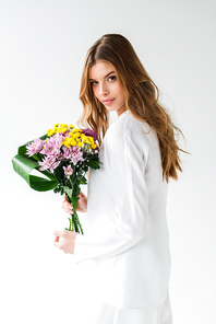 attractive girl holding bouquet of wildflowers on white