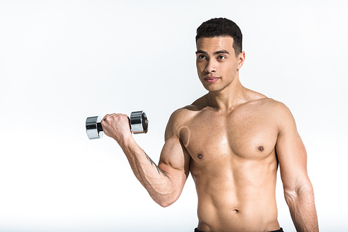 handsome mixed race man with shirtless muscular torso holding dumbbell on white