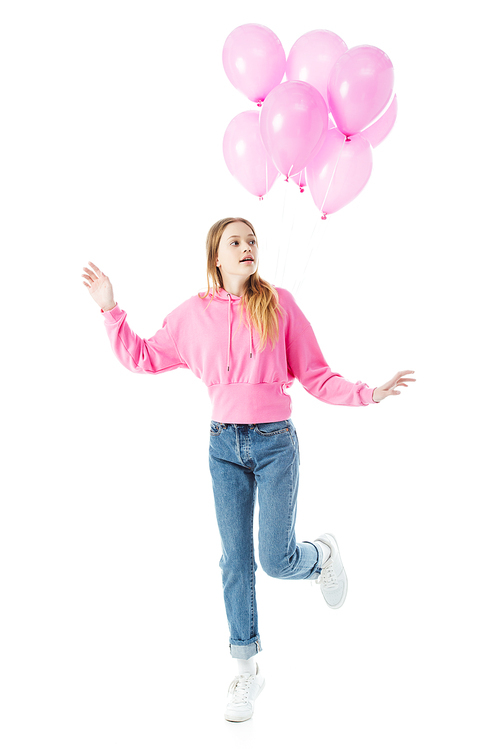 curious teenage girl with pink balloons isolated on white