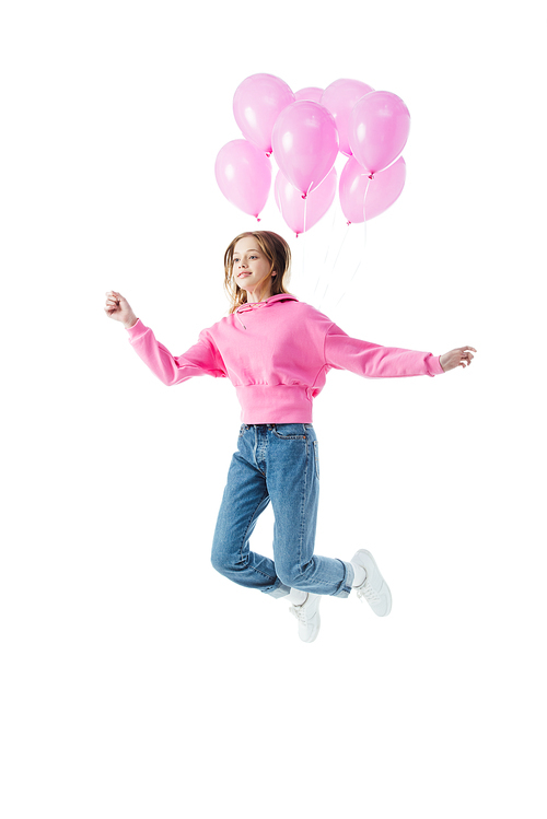 happy teenage girl with pink balloons jumping isolated on white