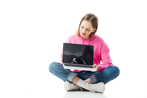 smiling teenage girl holding laptop with blank screen isolated on white, illustrative