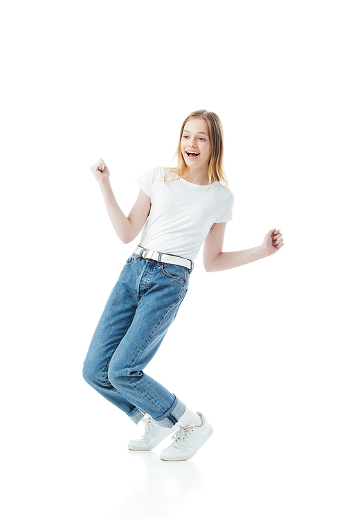 happy teenage girl dancing isolated on white