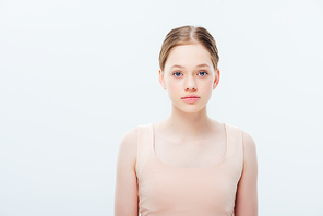 front view of serious teenage girl isolated on grey