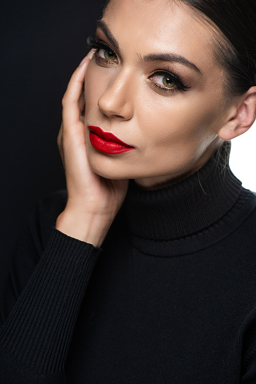 beautiful woman with red lips isolated on white and black