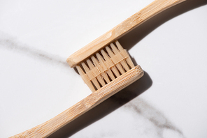 Top view of connected toothbrushes on white background, zero waste concept